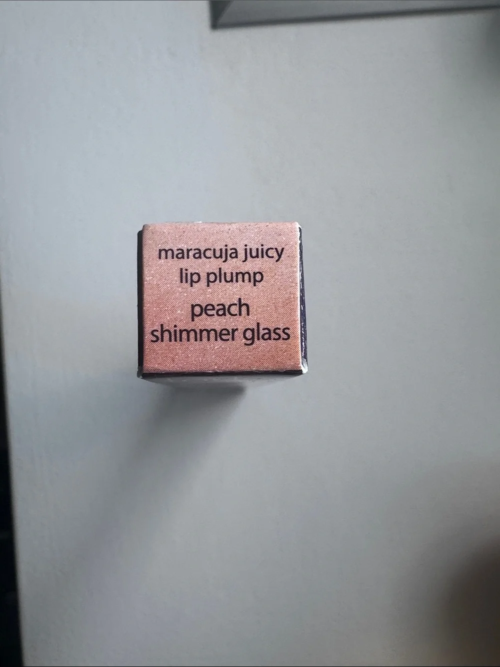 tarte Maracuja Juicy Lip Plump — peach shimmer glass